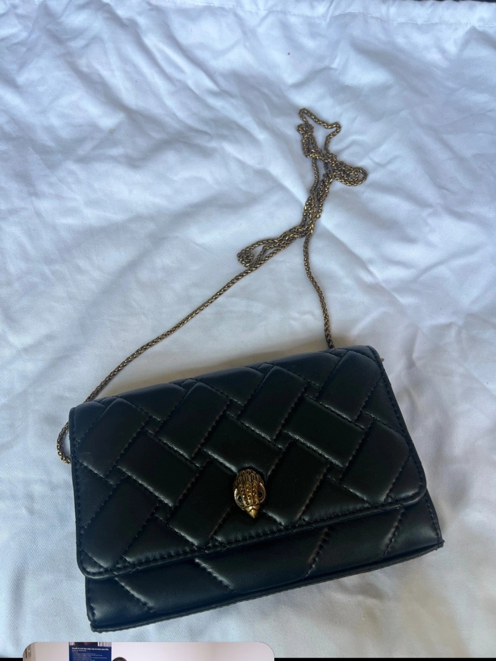 Kurt Geiger wallet on a chain or clutch